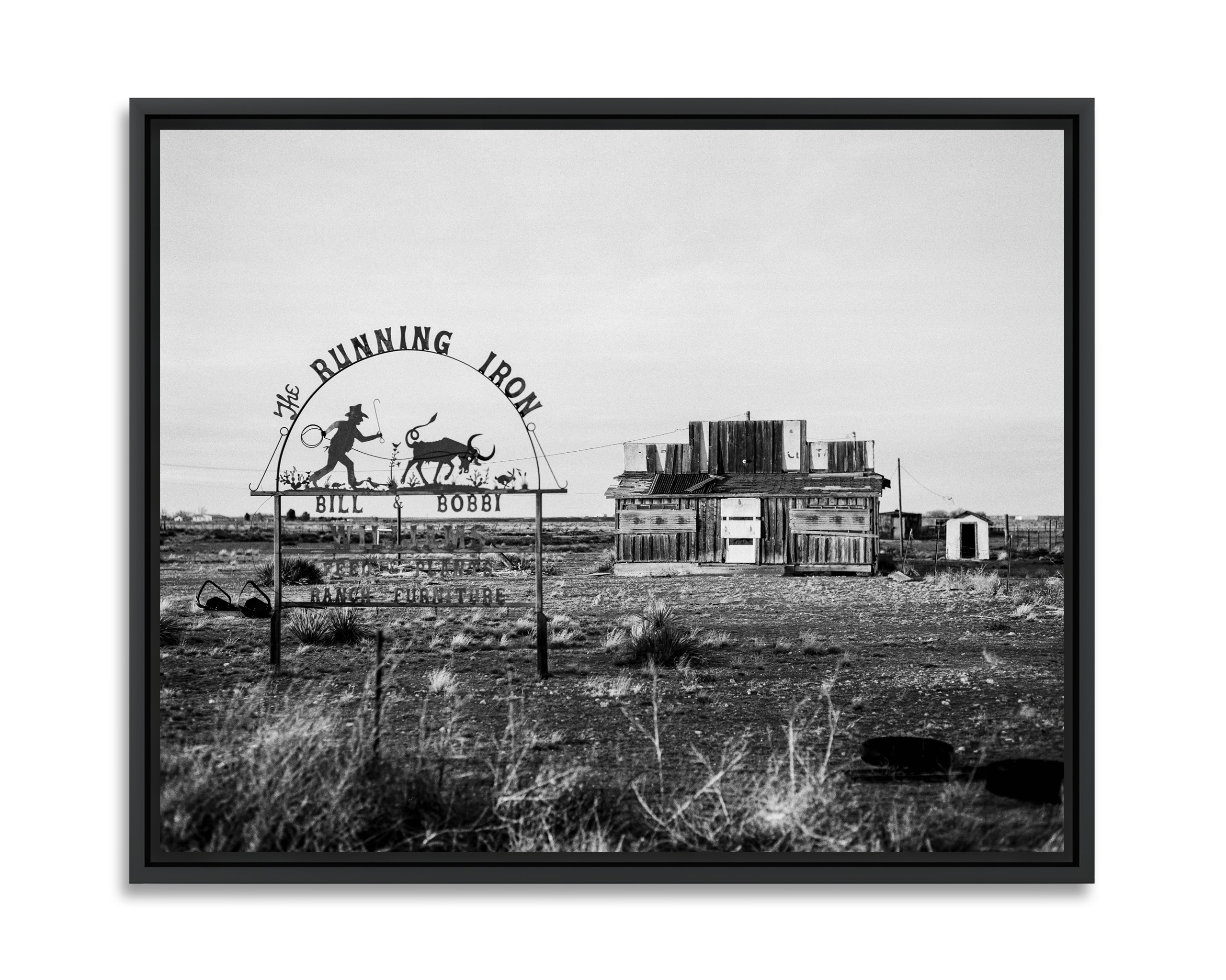 The Running Iron Le ranch de Bill & Bobby Williams au bord d'une route texane.